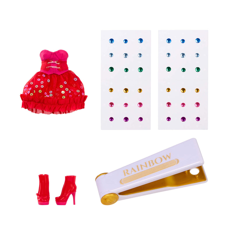 Gems, a small red dress, red high heels, and a 'Rainbow' branded bedazzling tool on a white background.