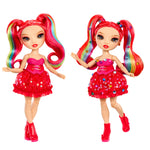 Two dolls -one with gems and one without gems, with red hair and dresses on a white background