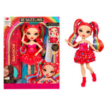 Rainbow High doll with red hair and a colorful outfit next to its packaging