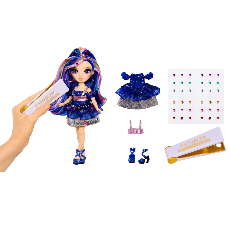 Toy doll with accessories including a dress, shoes, and a gem tool on a white background