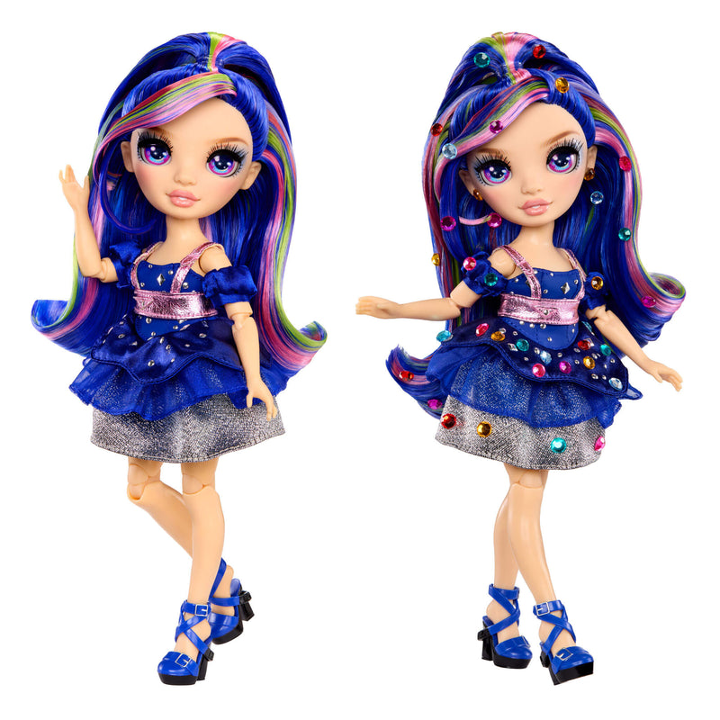 Two dolls one with gems and one without gems with colorful purple hair and outfits on a white background