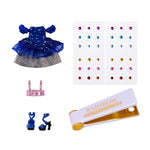 Doll outfit with blue dress, silver skirt, pink top accessory, shoes, rainbow gems, and a bedazzling tool  on a white background.