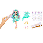 Toy doll with accessories including a gem tool, dress, shoes, and gems on a white background.