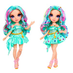 Two dolls one with gems one without gems with colorful hair and outfits on a white background