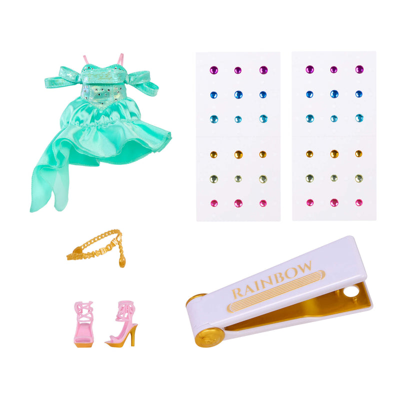 Collection of accessories including a Turquoise dress, gems, a gold belt, shoes and bedazzling tool on a white background.