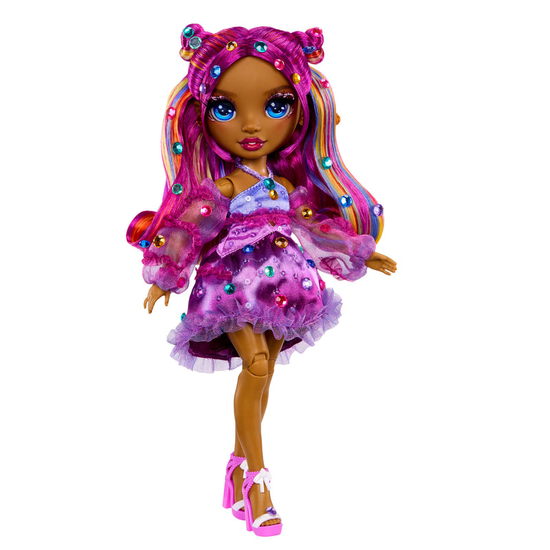 Colorful doll with gems in her pink hair and outfit on a white background