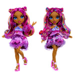 Two dolls one with gems and one without gems, with vibrant pink hair and outfits on a white background