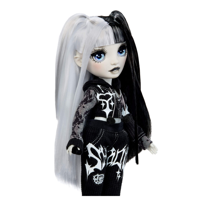 Heather Grayson doll with black and white hair and clothing on a white background