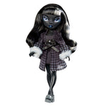 Shadow High doll with dark hair, blue eyes, and a checkered robe on a white background