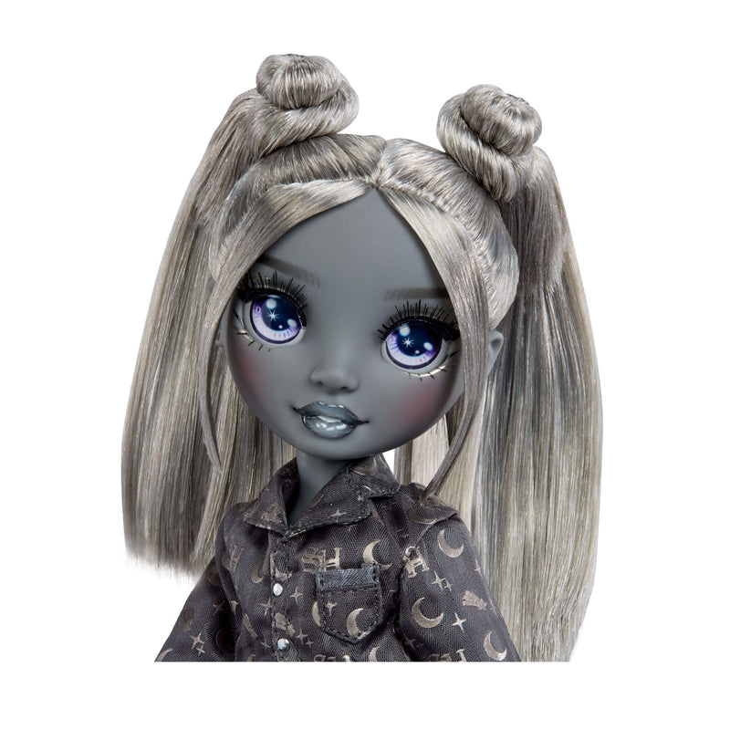 Doll with gray hair styled in buns and purple eyes wearing a dark outfit with patterns on a white background