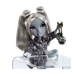 Luna doll with gray hair and purple eyes, holding head phones.