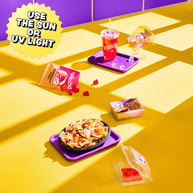 Colorful food items on a yellow surface with text about using sunlight or UV light.