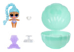 Toydoll with accessories and a green shell-like container on a white background