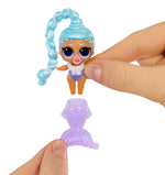 Small toy figure with blue braided hair and purple tail held by a hand on a white background