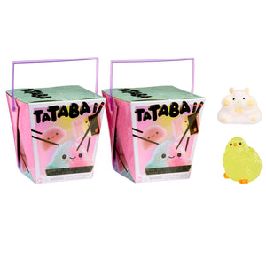 Two small boxes with 'Tataba' branding and cute illustrations, accompanied by two small plush toys on a white background.