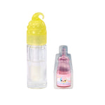 Clear bottle with yellow cap and pink and white bottle with character design on a white background