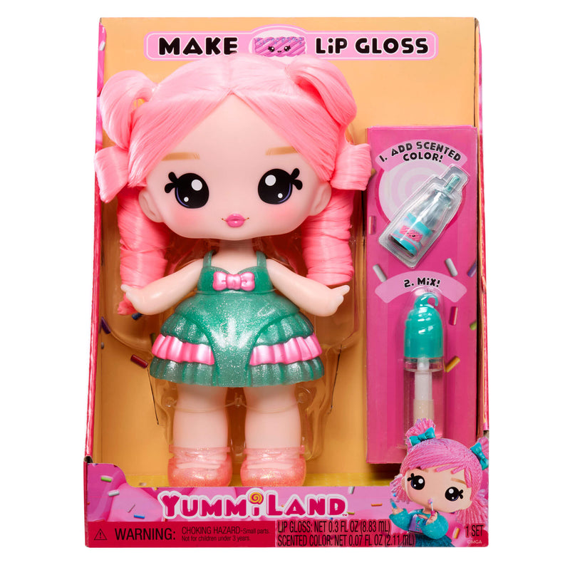 Yummiland doll with pink hair and green dress in packaging with lip gloss.