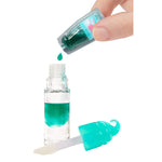 Hand pouring green liquid from a small container into a larger bottle with a dropper, on a white background.