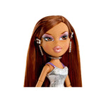 Toy doll with long brown hair and a silver dress on a white background