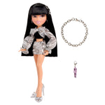 Fashion doll with black hair and outfit, bracelet, and keychain on a white background