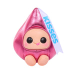 Pink plush toy with 'Kisses' label on a white background