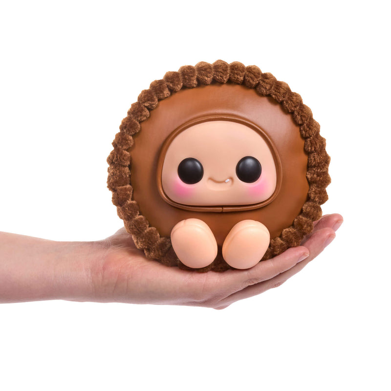 Cute brown plush toy resembling a Reese's Peanut Butter Cup with a face on a white background
