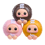 Three colorful character figurines with different colors on a white background