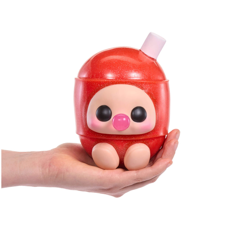 Red BLOW POP held in a hand against a white background