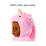 Plush toy with pink unicorn hood and pink yarn mane on a white background