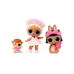 Three small dolls with different hairstyles and outfits on a white background