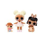 Three small dolls with different hairstyles and outfits on a white background