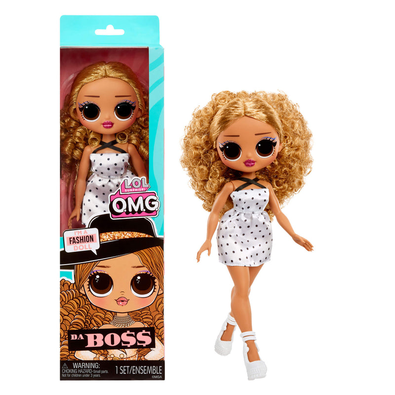 Toy doll with curly hair and polka dot dress next to its packaging