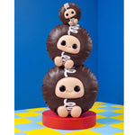Three different sizes of Hostess Cupcake stacked on a blue background
