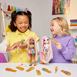 Two girls playing with the dolls