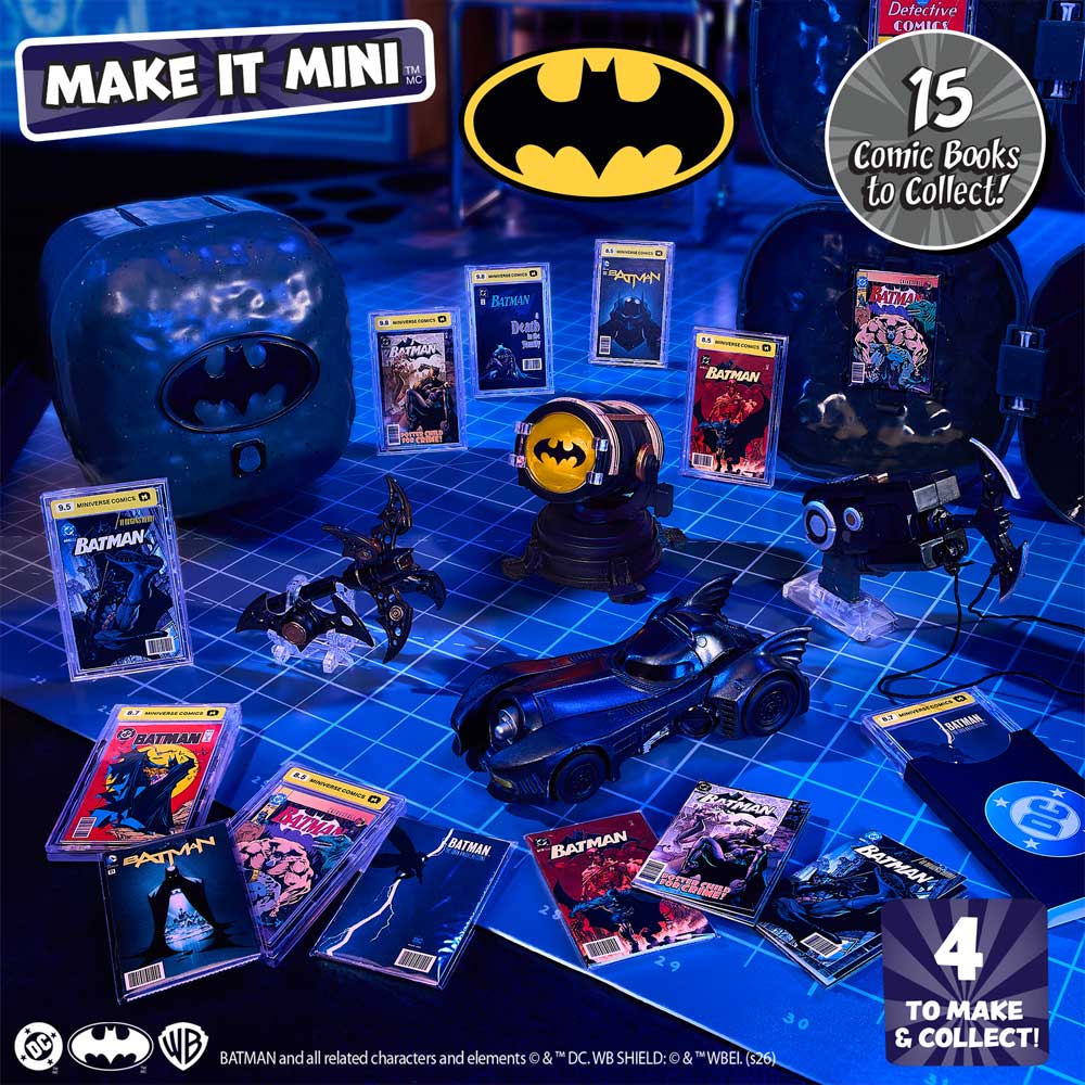 Batman 'Make It Mini' toy set display featuring a Batmobile, miniatures, comic books, and game components arranged on a blue grid mat with promotional text and Batman branding.