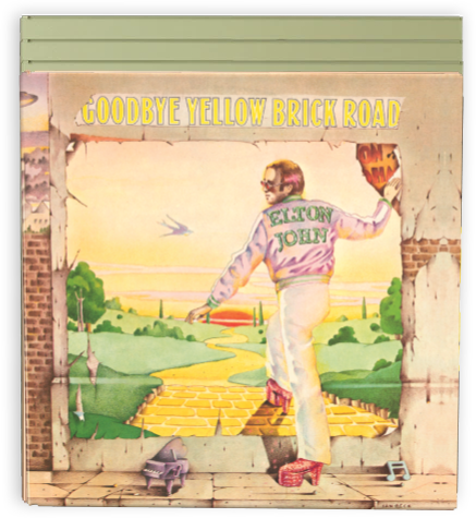 Album cover of 'Goodbye Yellow Brick Road' by Elton John with a person standing on a yellow brick road.
